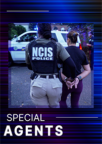 NCIS female Special Agent arresting another female, walking her in handcuffs to police vehicle.
